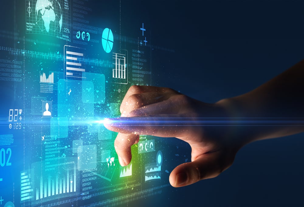 Female finger touching a beam of light surrounded by blue and green data and charts-2