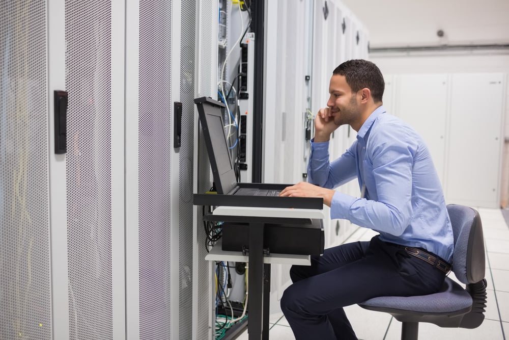 Man maintaining the servers in data center