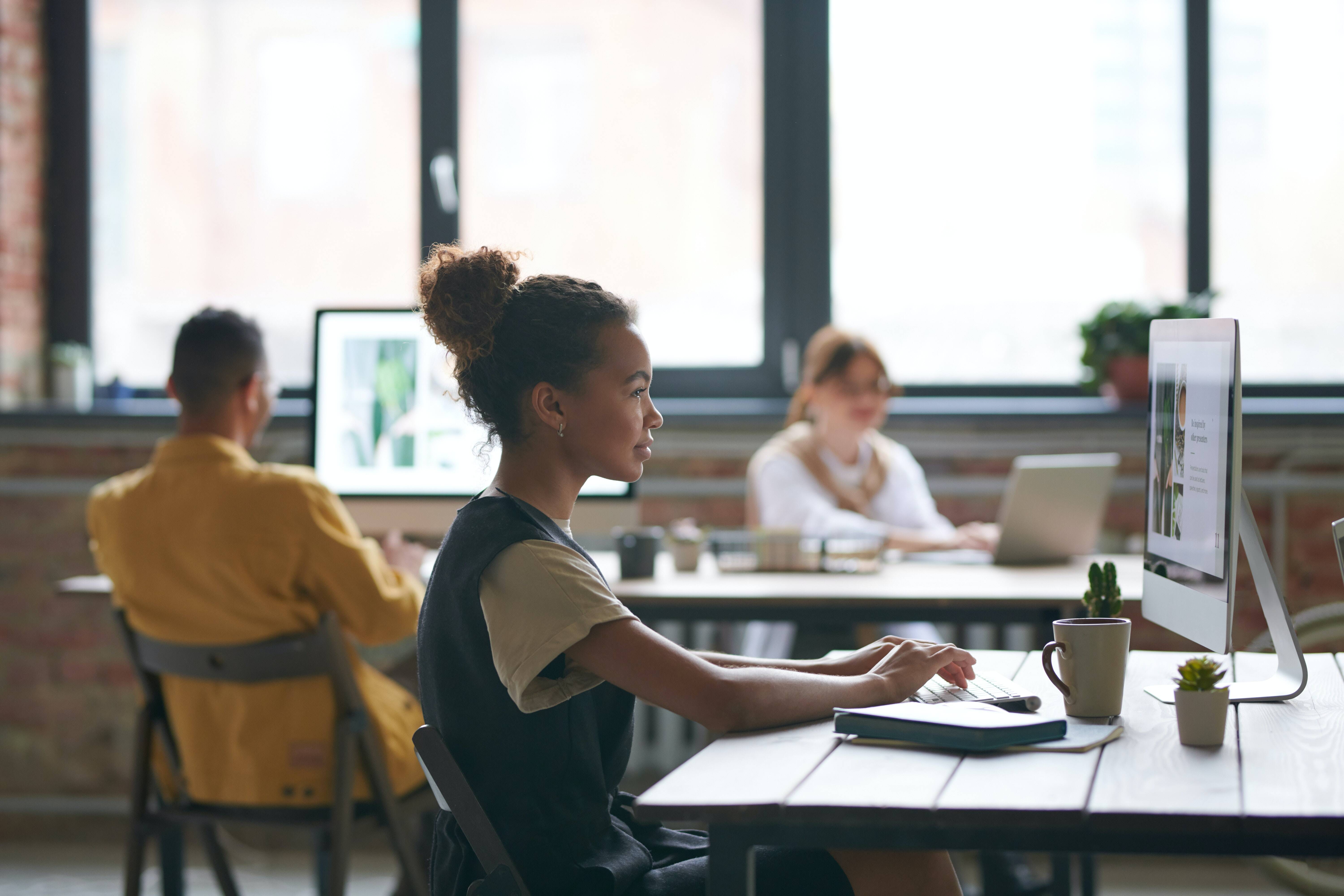 Woman on a computer in an office